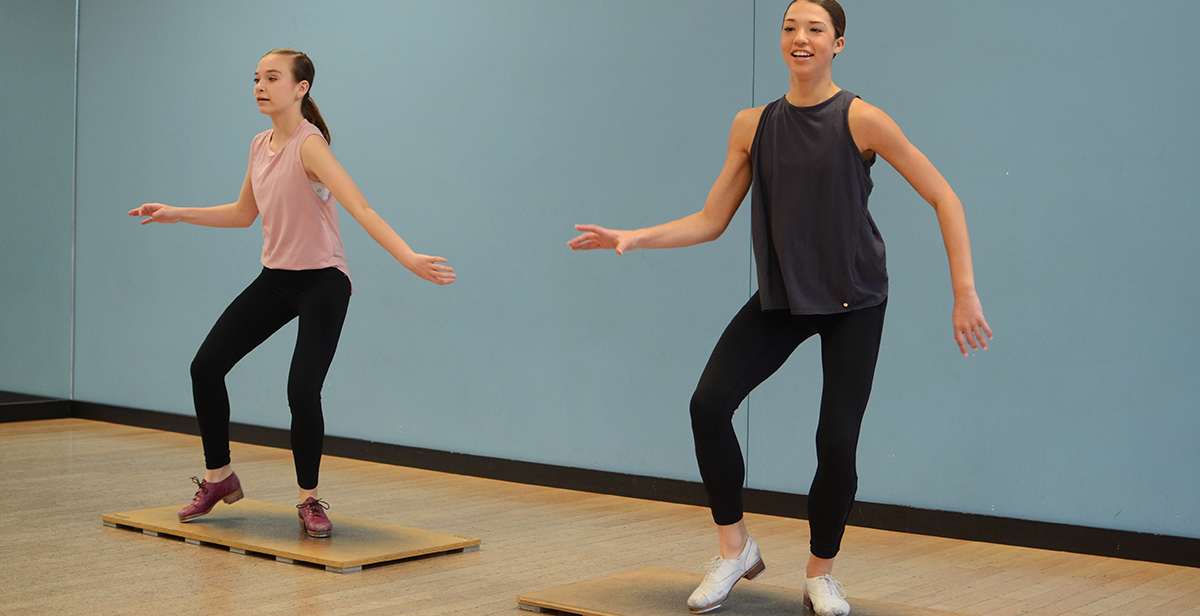 Teenage patients in dance studio.