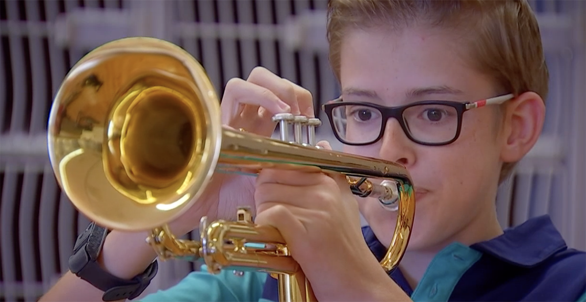 boy with band instrument