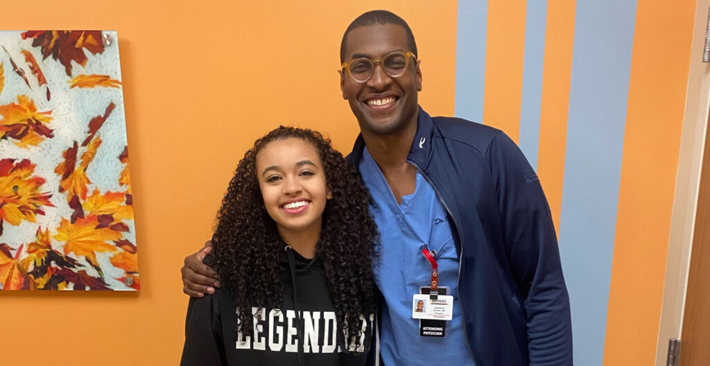 Dr. Jaysson T. Brooks with patient Aaliyah